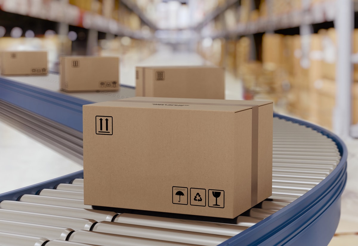 boxes on conveyor belt in warehouse