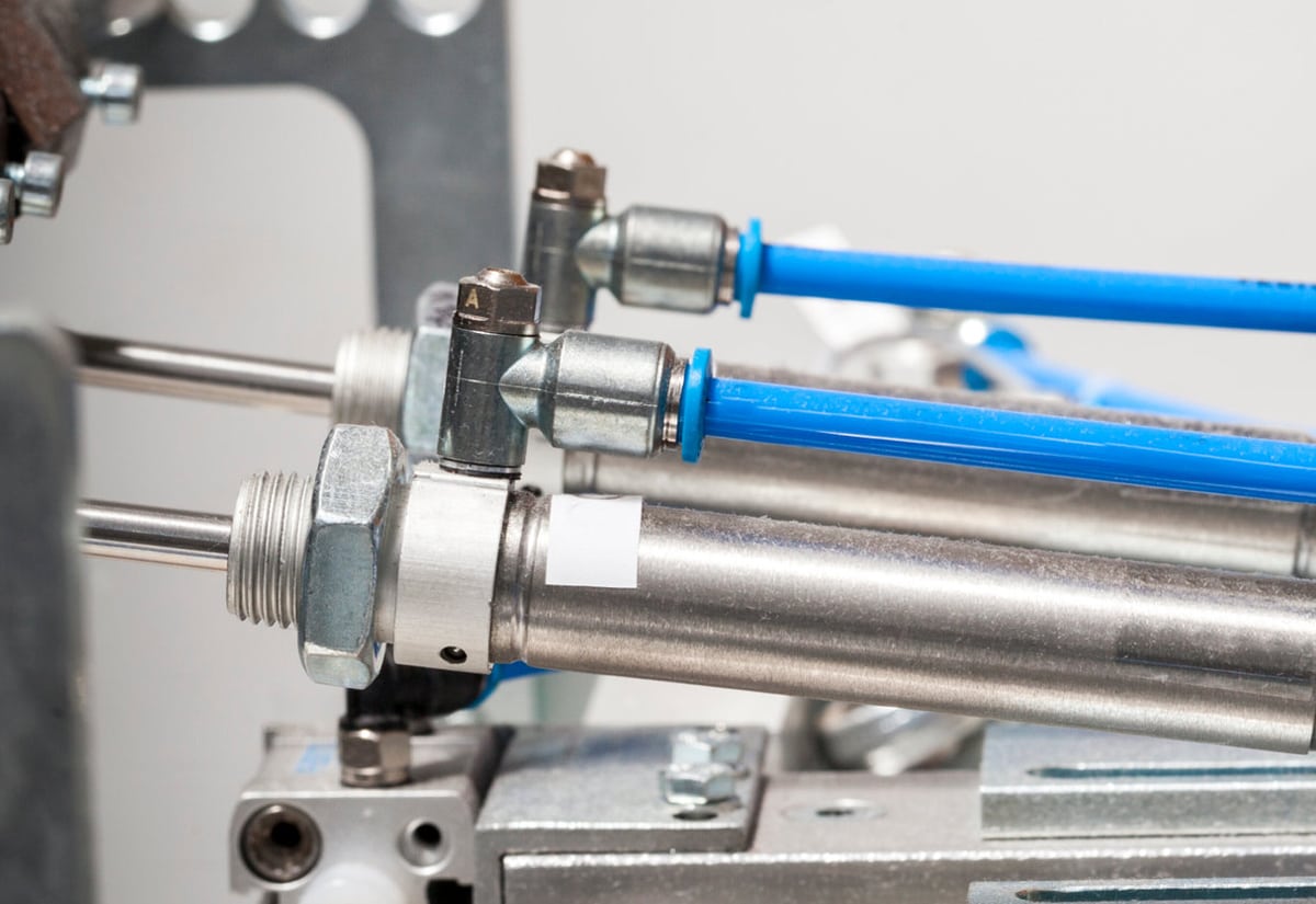 pneumatic cylinders on automated machinery